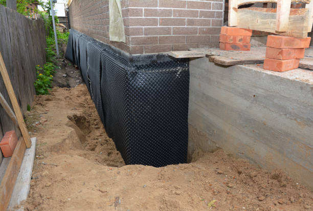 Happy homeowners after waterproofing job in Riverside